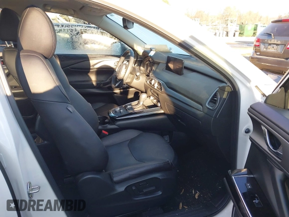 2021 Mazda CX-9 Touring with VIN JM3TCACY4M0522302, listed as a IAAI auction lot 41323543 with 35,223 mi miles and . Bid and sale history available at DreamBid. Image 5.