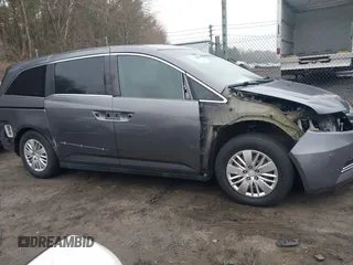 2014 Honda Odyssey LX z VIN 5FNRL5H2XEB009962, wystawiony jako IAAI lot #41902277 z przebiegiem 152 661 mil mil oraz . Historia ofert i sprzedaży dostępna na DreamBid. Obrazek 14.