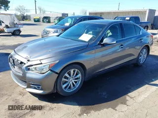 2014 Infiniti Q50 with VIN JN1BV7AP0EM682444, listed as a IAAI auction lot 41857312 with 140,765 mi miles. Bid and sale history available at carsss.com. Image 17.