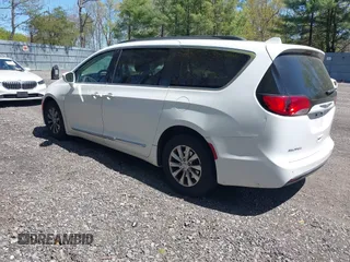 2017 Chrysler Pacifica Touring L with VIN 2C4RC1BG0HR821230, listed as a IAAI auction lot 42158120 with 98,354 mi miles and . Bid and sale history available at DreamBid. Image 3.