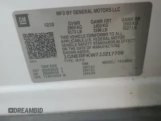 2018 Chevrolet Traverse LS with VIN 1GNERFKW7JJ217709, listed as a Copart auction lot 63332405 with 127,758 mi miles and Salvage title. Bid and sale history available at DreamBid. Image 13.