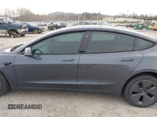 2023 Tesla Model 3 with VIN 5YJ3E1EA5PF474382, listed as a IAAI auction lot 41764268 with 31,040 mi miles and . Bid and sale history available at DreamBid. Image 13.