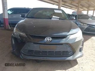 2014 Scion tC z VIN JTKJF5C75E3069757, wystawiony jako IAAI lot #42175725 z przebiegiem 191 054 mil mil oraz . Historia ofert i sprzedaży dostępna na DreamBid. Obrazek 12.