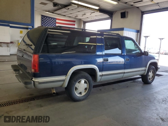 1999 GMC Suburban z VIN 3GKFK16R5XG525338, wystawiony jako Copart lot #58920565 z przebiegiem 212 586 mil mil oraz Szkody całkowita. Historia ofert i sprzedaży dostępna na DreamBid. Obrazek 3.