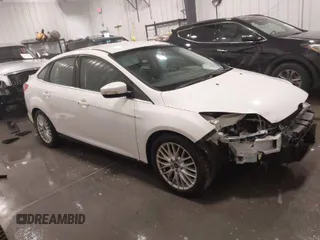 2014 Ford Focus Titanium with VIN 1FADP3J22EL406937, listed as a IAAI auction lot 41717666 with 172,646 mi miles. Bid and sale history available at carsss.com. Image 1.