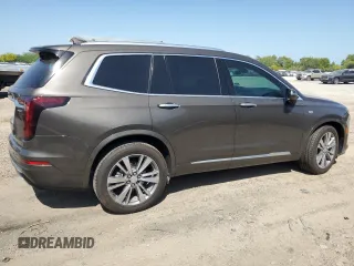 2020 Cadillac XT6 FWD Premium Luxury with VIN 1GYKPCRS1LZ199080, listed as a Copart auction lot 52252865 with 68,494 mi miles and Salvage title. Bid and sale history available at DreamBid. Image 3.