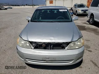 2001 Toyota Avalon XL z VIN 4T1BF28B11U154831, wystawiony jako Copart lot #57131435 z przebiegiem 211 745 mil mil oraz Szkody całkowita. Historia ofert i sprzedaży dostępna na DreamBid. Obrazek 5.