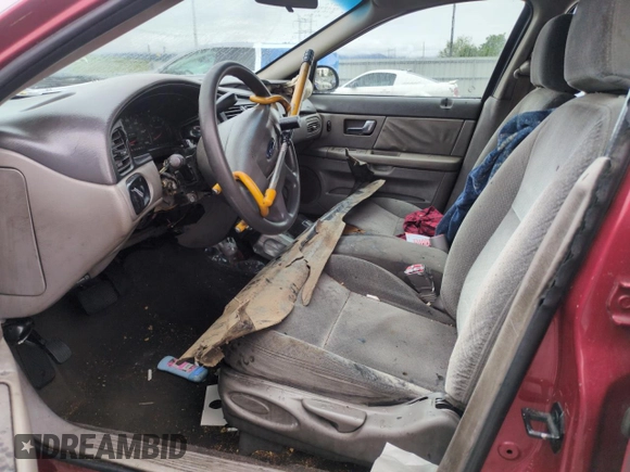 2001 Ford Taurus LX with VIN 1FAFP52UX1A176008, listed as a Copart auction lot 58983935 with 123,985 mi miles and Salvage title. Bid and sale history available at DreamBid. Image 7.