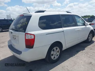 2010 Kia Sedona LX with VIN KNDMG4C33A6338047, listed as a IAAI auction lot 42128485 with 99,498 mi miles and . Bid and sale history available at carsss.com. Image 4.