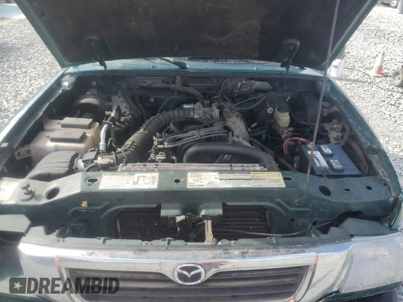 1999 Mazda B-Series Truck SX z VIN 4F4YR12CXXTM34917, wystawiony jako Copart lot #50821635 z przebiegiem 121 165 mil mil oraz Szkoda całkowita • Salvage title. Historia ofert i sprzedaży dostępna na DreamBid. Obrazek 11.