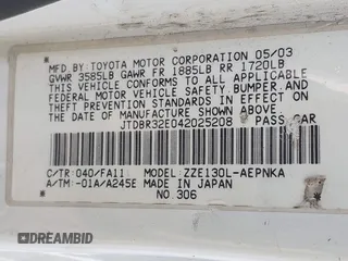 2004 Toyota Corolla CE with VIN JTDBR32E042025208, listed as a IAAI auction lot 41934485 with 299,999 mi miles. Bid and sale history available at carsss.com. Image 9.