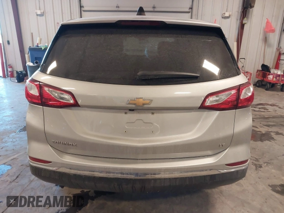 2021 Chevrolet Equinox LT with VIN 2GNAXKEV2M6110942, listed as a IAAI auction lot 41310030 with 97,134 mi miles. Bid and sale history available at carsss.com. Image 16.