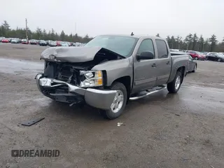 2013 Chevrolet Silverado 1500 LT with VIN 3GCPKSE75DG275651, listed as a IAAI auction lot 41805883 with 142,729 mi miles. Bid and sale history available at carsss.com. Image 2.