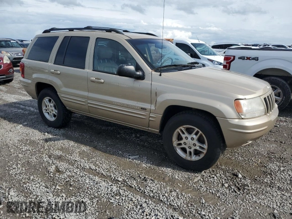 2000 Jeep Grand Cherokee Limited with VIN 1J4GW58N7YC327607, listed as a Copart auction lot 54711615 with 108,241 mi miles and Salvage title. Bid and sale history available at DreamBid. Image 4.