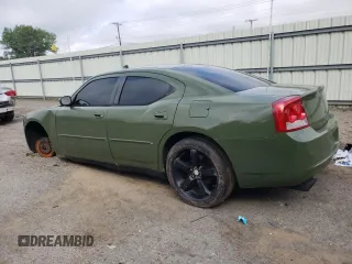 2010 Dodge Charger Police z VIN 2B3CA4CT7AH245139, wystawiony jako Copart lot #54257155 z przebiegiem 219 135 mil mil oraz Czysty tytuł • Clean title. Historia ofert i sprzedaży dostępna na DreamBid. Obrazek 2.