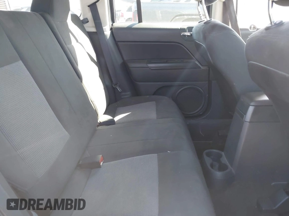 2013 Jeep Patriot Sport with VIN 1C4NJPBA0DD245736, listed as a IAAI auction lot 41651282 with 227,456 mi miles. Bid and sale history available at carsss.com. Image 8.