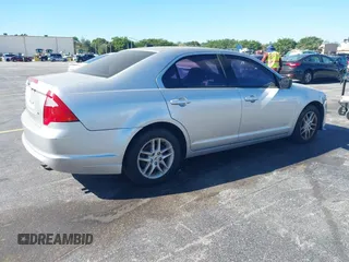 2011 Ford Fusion S with VIN 3FAHP0GA1BR316318, listed as a IAAI auction lot 41824086 with 122,229 mi miles. Bid and sale history available at carsss.com. Image 4.