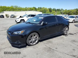 2011 Scion tC z VIN JTKJF5C70B3016542, wystawiony jako Copart lot #55829715 z przebiegiem 99 791 mil mil oraz Szkoda całkowita • Salvage title. Historia ofert i sprzedaży dostępna na DreamBid. Obrazek 1.