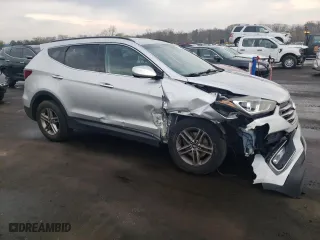 2017 Hyundai Santa Fe Sport 2.4L with VIN 5XYZUDLB6HG412087, listed as a Copart auction lot 52124305 with 157,175 mi miles and Salvage Title. Bid and sale history available at carsss.com. Image 4.