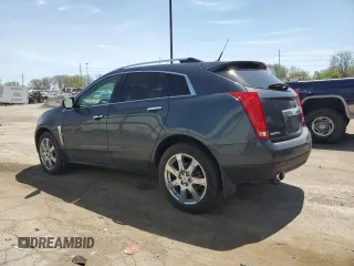 2012 Cadillac SRX Performance Collection z VIN 3GYFNEE31CS602568, wystawiony jako Copart lot #54751375 z przebiegiem 144 228 mil mil oraz Szkody całkowita. Historia ofert i sprzedaży dostępna na DreamBid. Obrazek 2.