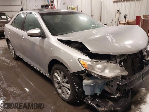 2014 Toyota Camry L with VIN 4T4BF1FK4ER412428, listed as a IAAI auction lot 41573095 with 130,000 mi miles. Bid and sale history available at carsss.com. Image 1.