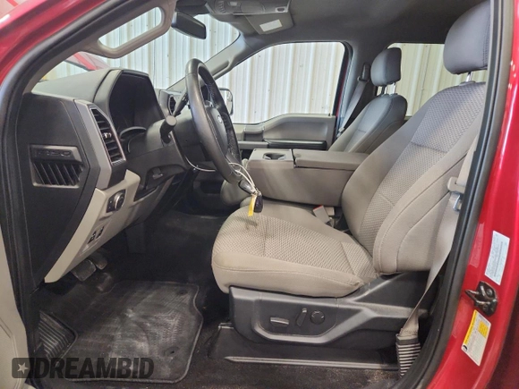 2020 Ford F-150 XL with VIN 1FTEW1E58LFB80912, listed as a Copart auction lot 65170605 with 75,815 mi miles and Salvage title. Bid and sale history available at DreamBid. Image 7.
