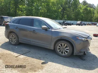 2016 Mazda CX-9 Touring with VIN JM3TCACY2G0121643, listed as a Copart auction lot 53341555 with 143,650 mi miles and Salvage title. Bid and sale history available at DreamBid. Image 4.