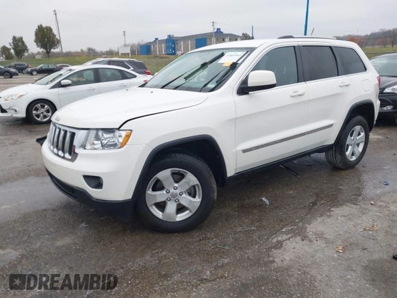 2012 Jeep Grand Cherokee Laredo with VIN 1C4RJFAG6CC297958, listed as a IAAI auction lot 40859811 with 213,499 mi miles. Bid and sale history available at carsss.com. Image 2.