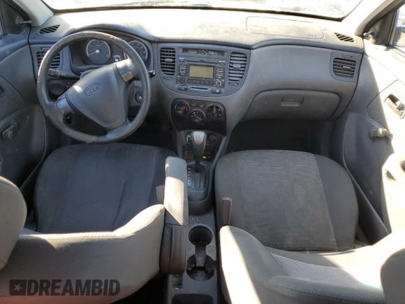 2009 Kia Rio LX with VIN KNADE243796516902, listed as a Copart auction lot 86567394 with 304,684 mi miles and Salvage Title. Bid and sale history available at carsss.com. Image 8.