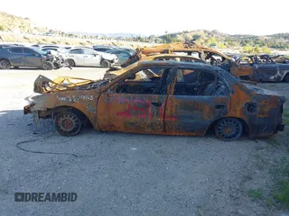 1999 Toyota Corolla VE z VIN 1NXBR12E4XZ178165, wystawiony jako IAAI lot #41367780 z przebiegiem Nie podano mil oraz . Historia ofert i sprzedaży dostępna na DreamBid. Obrazek 3.