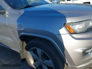 2014 Jeep Grand Cherokee Overland with VIN 1C4RJFCGXEC162238, listed as a IAAI auction lot 41291512 with 88,261 mi miles. Bid and sale history available at carsss.com. Image 6.