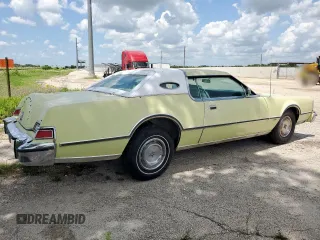 1975 Lincoln Continental z VIN 5Y89A889209, wystawiony jako Copart lot #64262235 z przebiegiem 86 783 mil mil oraz Czysty tytuł • Clean title. Historia ofert i sprzedaży dostępna na DreamBid. Obrazek 3.