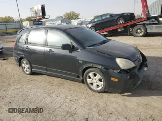 2003 Suzuki Aerio SX z VIN JS2RC41H135205642, wystawiony jako Copart lot #77690224 z przebiegiem 161 414 mil mil oraz Szkoda całkowita • Salvage title. Historia ofert i sprzedaży dostępna na DreamBid. Obrazek 4.