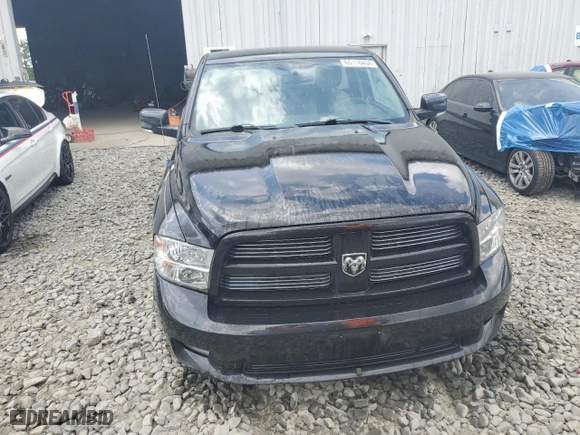 2010 Dodge Ram 1500 Sport with VIN 3D7JV1ET0AG191856, listed as a Copart auction lot 65118404 with 65,338 mi miles and Salvage Title. Bid and sale history available at carsss.com. Image 5.