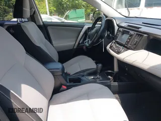 2018 Toyota RAV4 XLE with VIN JTMWFREV9JJ201845, listed as a IAAI auction lot 42442303 with 111,177 mi miles and . Bid and sale history available at DreamBid. Image 5.