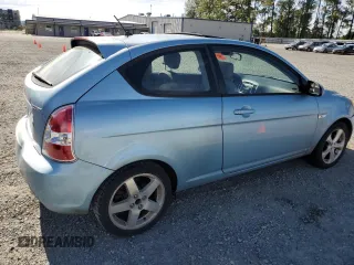 2007 Hyundai Accent SE z VIN KMHCN36CX7U048587, wystawiony jako Copart lot #59305325 z przebiegiem 85 492 mil mil oraz Szkoda całkowita • Salvage title. Historia ofert i sprzedaży dostępna na DreamBid. Obrazek 3.