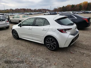 2019 Toyota Corolla Hatchback SE with VIN JTNK4RBEXK3051691, listed as a Copart auction lot 77159164 with 21,051 mi miles and Salvage Title. Bid and sale history available at carsss.com. Image 2.