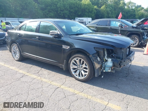 2014 Ford Taurus Limited with VIN 1FAHP2F86EG163392, listed as a IAAI auction lot 42538336 with 131,910 mi miles and . Bid and sale history available at DreamBid. Image 1.