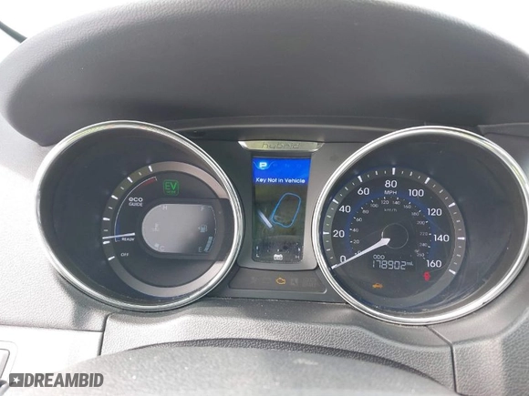 2012 Hyundai Sonata Hybrid with VIN KMHEC4A45CA043197, listed as a IAAI auction lot 41611904 with 178,902 mi miles. Bid and sale history available at carsss.com. Image 7.