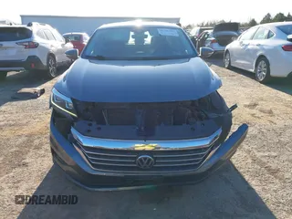 2021 Volkswagen Passat 2.0T SE with VIN 1VWSA7A3XMC008583, listed as a IAAI auction lot 41786307 with 56,446 mi miles. Bid and sale history available at carsss.com. Image 13.