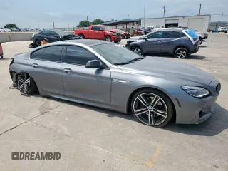 2018 BMW 6 Series 650i z VIN WBA6D4C59JD981398, wystawiony jako Copart lot #53455655 z przebiegiem 19 752 mil mil oraz Szkody całkowita. Historia ofert i sprzedaży dostępna na DreamBid. Obrazek 4.