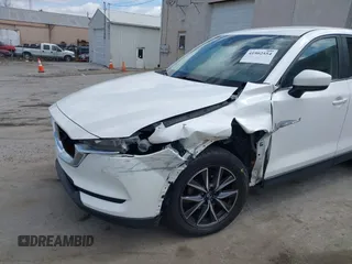 2018 Mazda CX-5 Touring with VIN JM3KFBCMXJ0353369, listed as a IAAI auction lot 41902554 with 154,104 mi miles and . Bid and sale history available at DreamBid. Image 6.