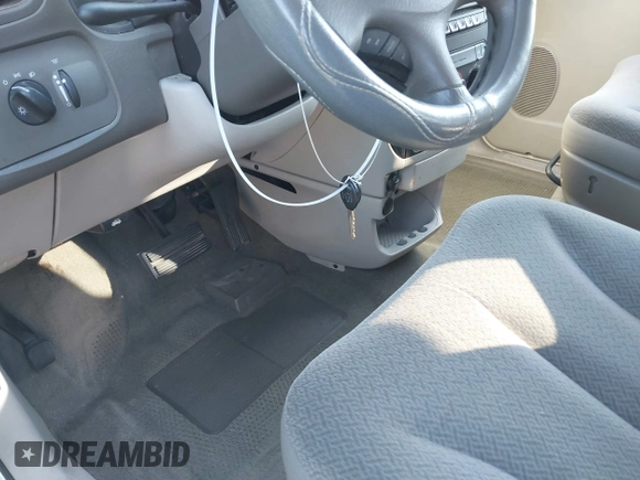 2005 Dodge Caravan SE with VIN 1D4GP25EX5B333234, listed as a IAAI auction lot 41389490 with 161,447 mi miles and . Bid and sale history available at DreamBid. Image 11.