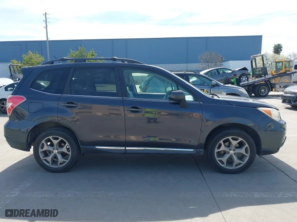 2015 Subaru Forester 2.5i Touring with VIN JF2SJAWC4FH523997, listed as a IAAI auction lot 41884674 with 175,127 mi miles. Bid and sale history available at carsss.com. Image 14.