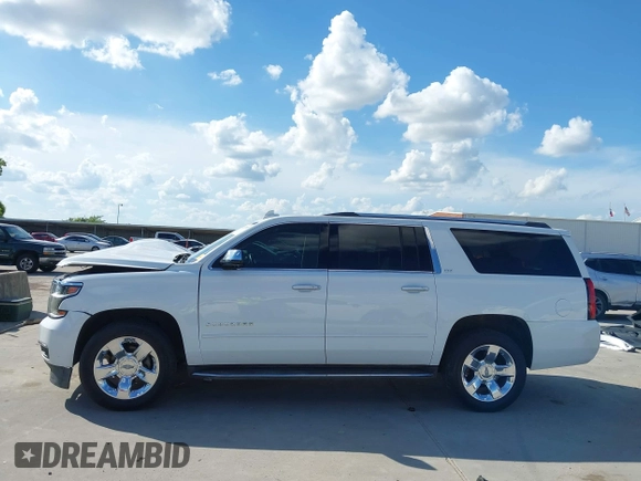 2016 Chevrolet Suburban LTZ with VIN 1GNSKJKC0GR109295, listed as a IAAI auction lot 42612085 with 200,912 mi miles and . Bid and sale history available at DreamBid. Image 14.