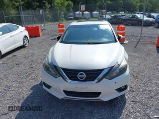 2016 Nissan Altima SR with VIN 1N4AL3APXGC263779, listed as a IAAI auction lot 42356375 with 172,380 mi miles and . Bid and sale history available at DreamBid. Image 12.