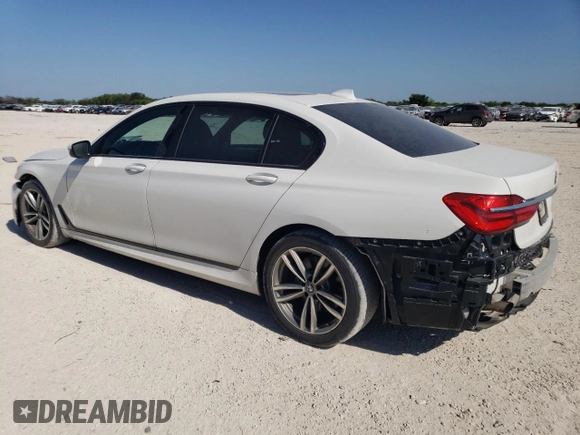 2018 BMW 7 Series 740i with VIN WBA7E2C58JG741652, listed as a Copart auction lot 57802073 with 79,441 mi miles. Bid and sale history available at carsss.com. Image 2.