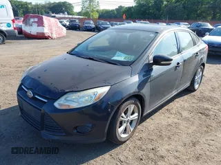 2013 Ford Focus SE with VIN 1FADP3F21DL230177, listed as a IAAI auction lot 42579815 with 243,525 mi miles and . Bid and sale history available at DreamBid. Image 12.