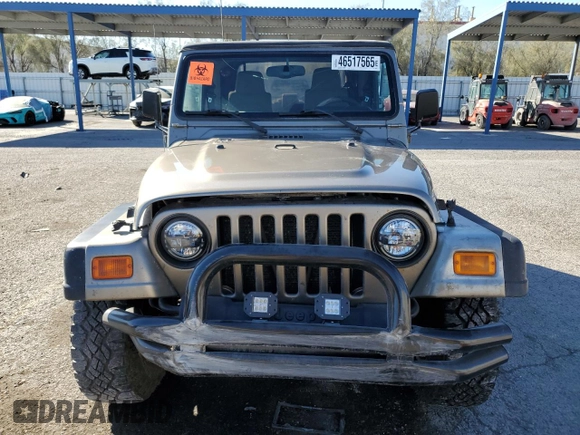 2003 Jeep Wrangler Sahara z VIN 1J4FA59S43P369233, wystawiony jako Copart lot #46517565 z przebiegiem 169 232 mil mil oraz Szkoda całkowita • Salvage title. Historia ofert i sprzedaży dostępna na DreamBid. Obrazek 5.