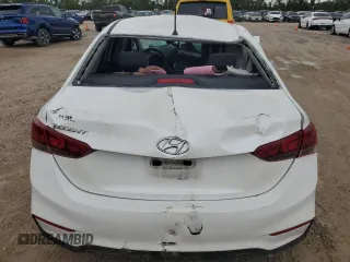 2019 Hyundai Accent SE with VIN 3KPC24A36KE067915, listed as a Copart auction lot 64745104 with 122,745 mi miles and Salvage Title. Bid and sale history available at carsss.com. Image 6.